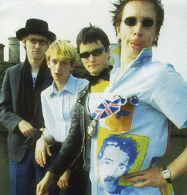 PiL on roof of Gunter Grove, 1978 © Dennis Morris